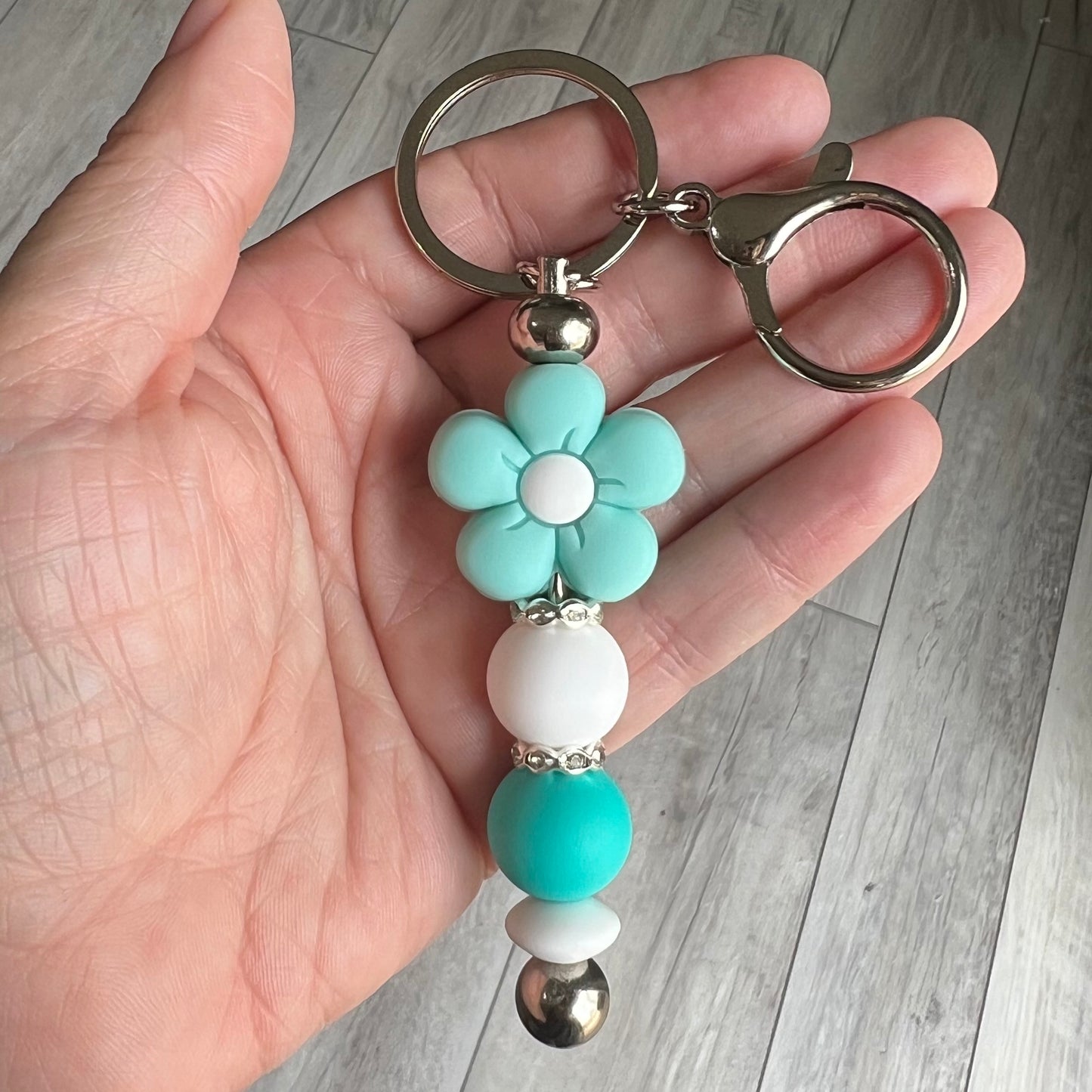 Teal flower bar keychain