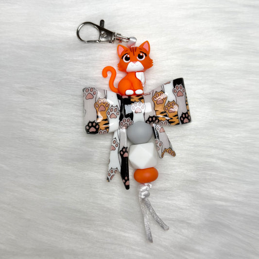 ORANGE CAT AND PAW BOW KEYCHAIN/ZIPPER PULL