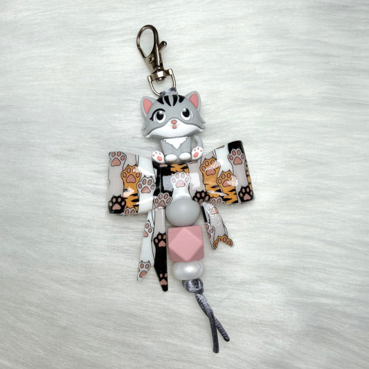GRAY CAT AND PAW BOW KEYCHAIN/ZIPPER PULL